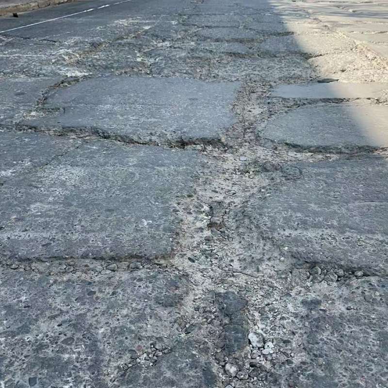 北塘路面起砂露石子修补料
